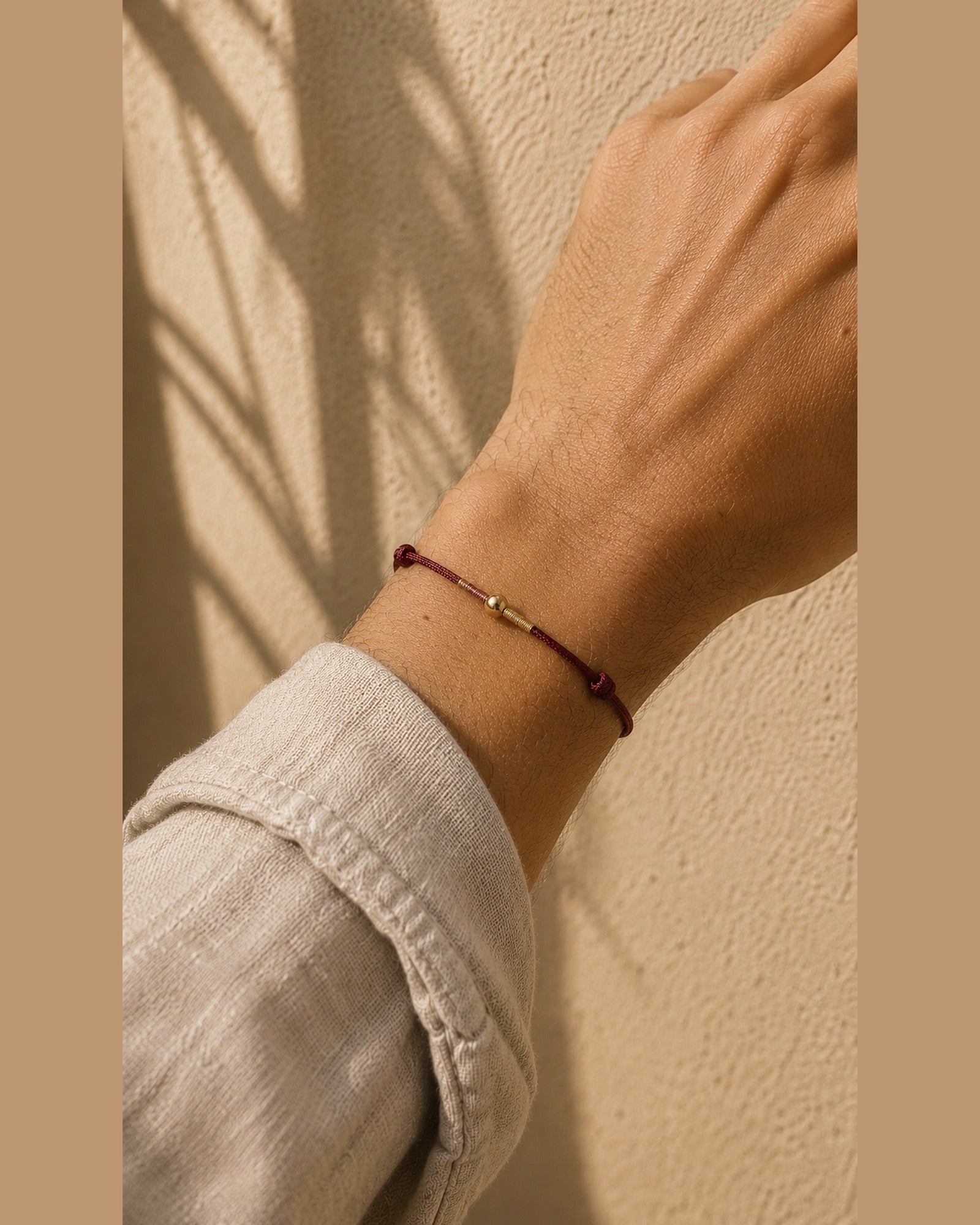 Silver Bead Cord Bracelet worn