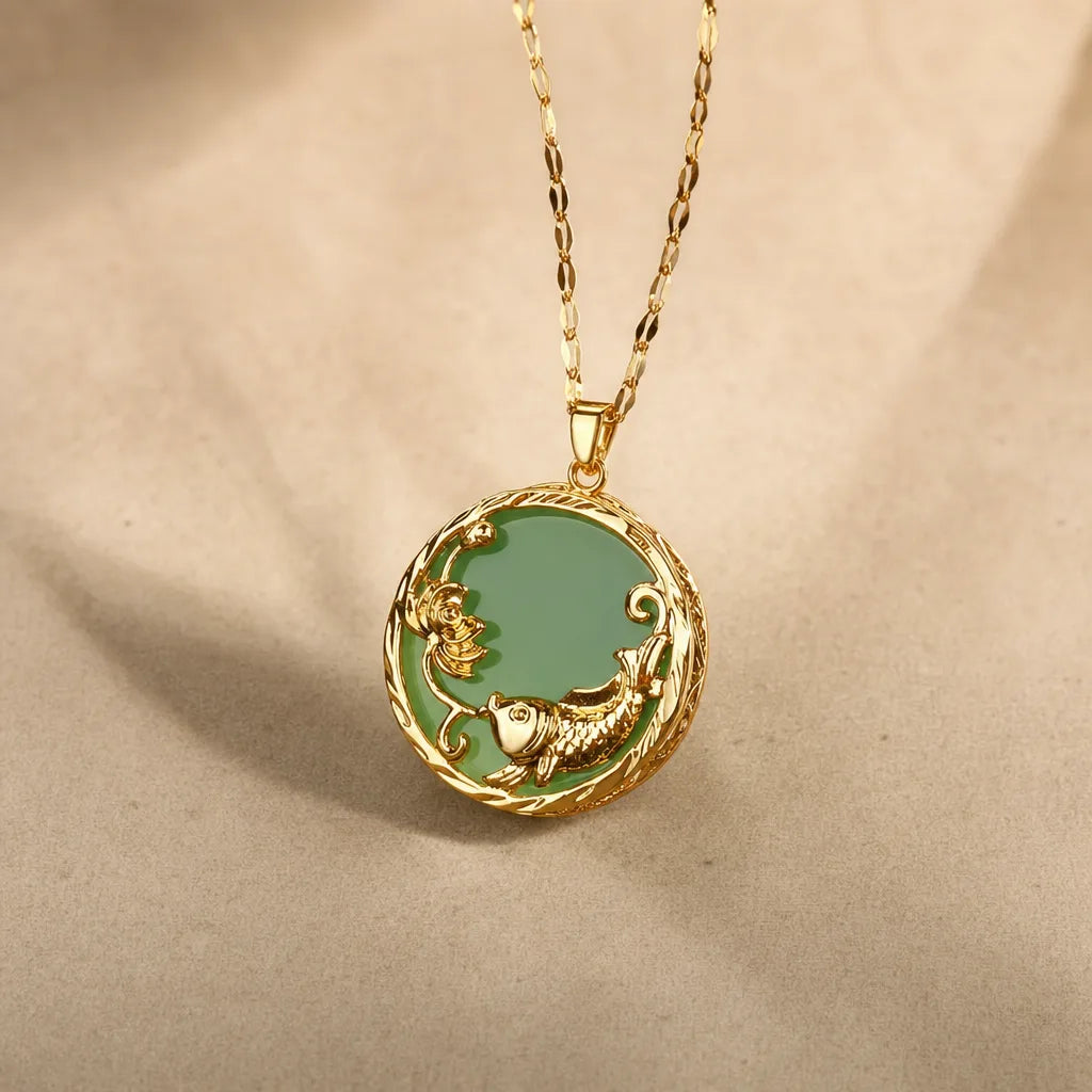 Jade Koi Fish Lotus Pendant Necklace - Lucky Gold Charm, ZAIA jewelry, pack view. PACK — Studio product. Warm natural light, low-contrast editorial photography.