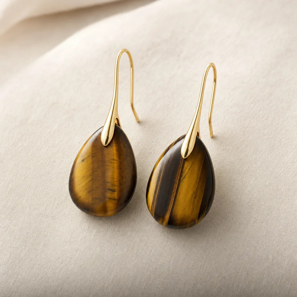 Tiger's Eye Drop Earrings - Gold & Silver Plated, ZAIA jewelry, pack view. PACK — Studio product. Warm natural light, low-contrast editorial photography.