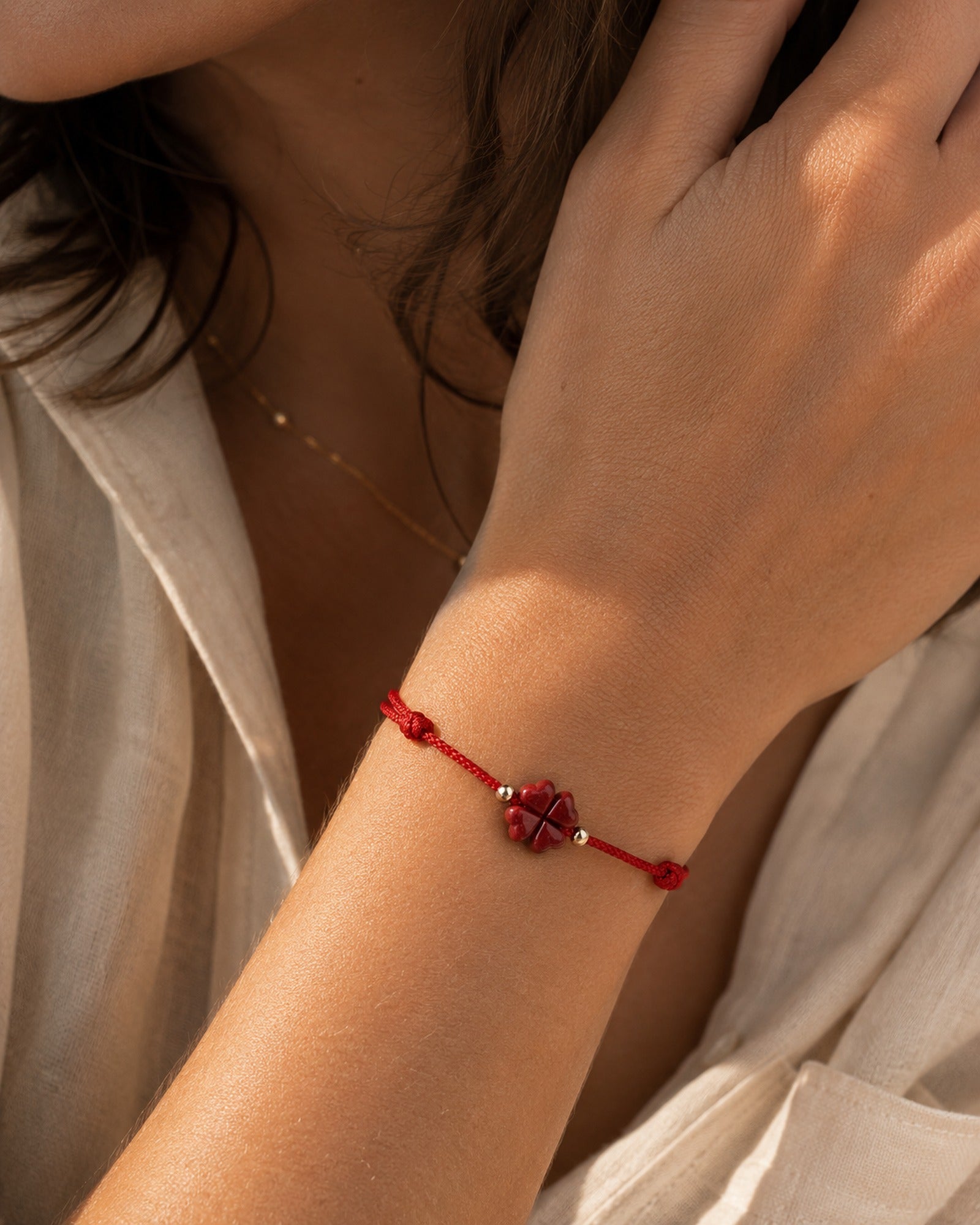 Cinnabar Clover Bracelet worn