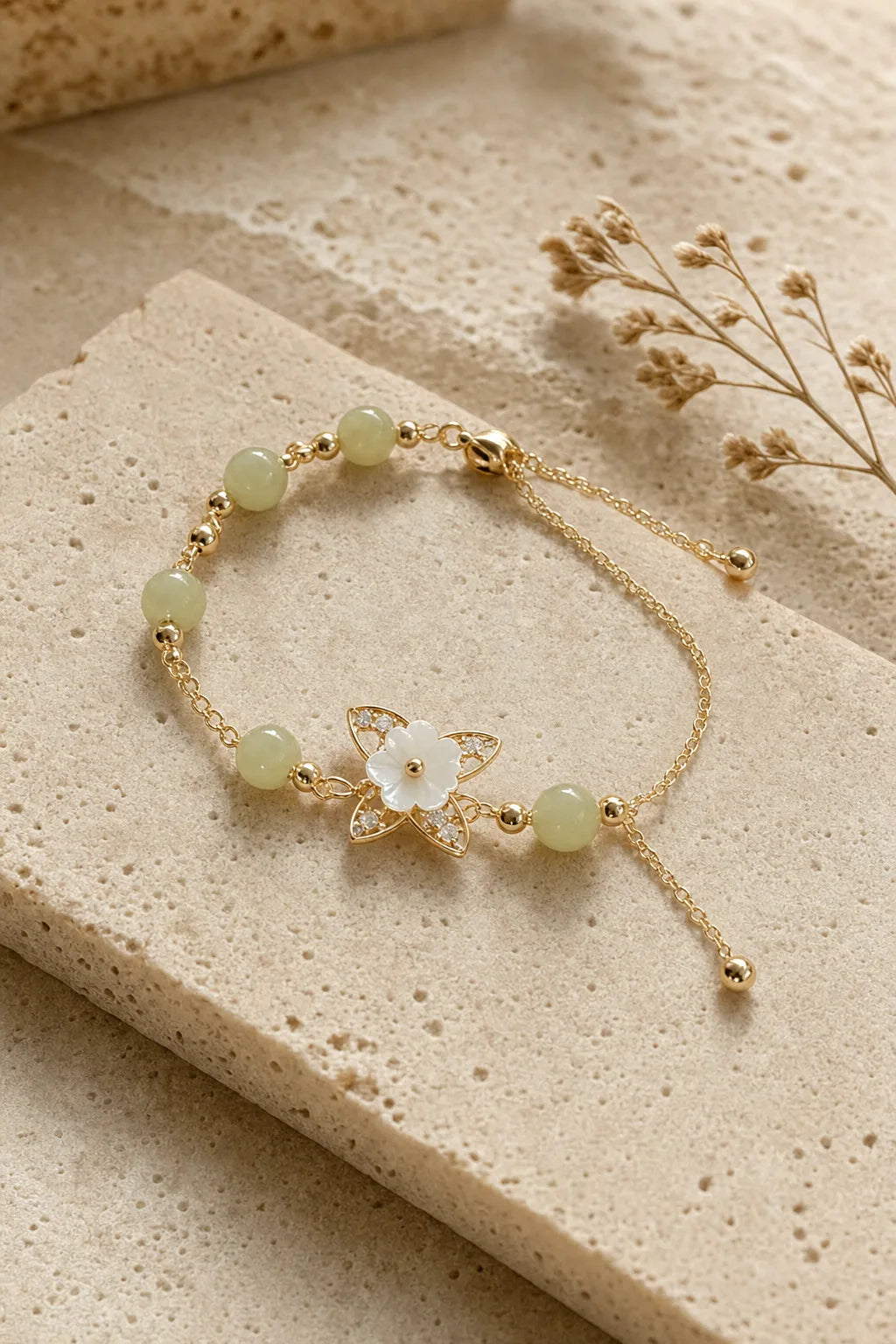 Jade Butterfly Bracelet, ZAIA jewelry, hero view. HERO — Editorial still life. Warm natural light, low-contrast editorial photography.